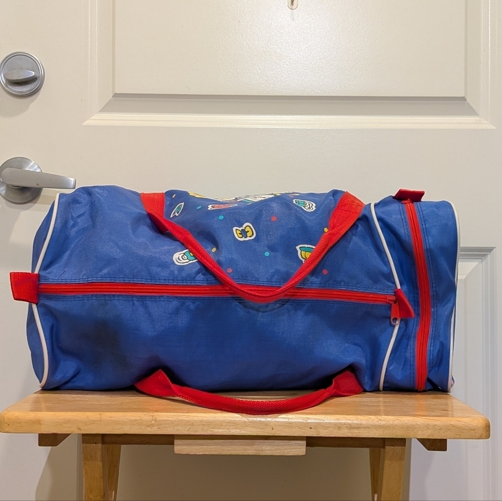 Rad 90s Flomo Cartoon Dog Red and Blue Duffel Bag - Picture 9 of 9